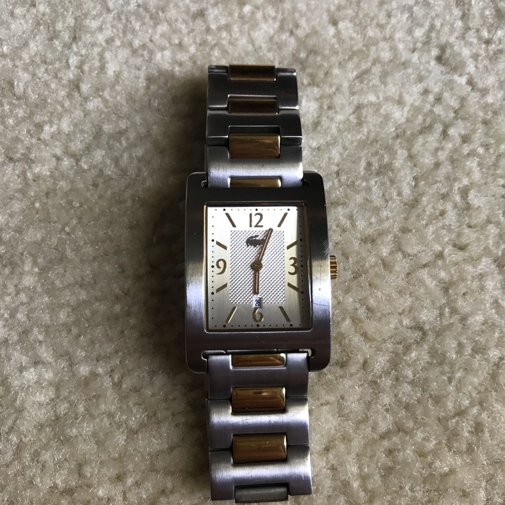 Lacoste Men’s stainless steel/gold colored watch. *Used, with broken crown*